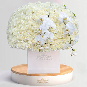 150 white roses with white orchids in a white box