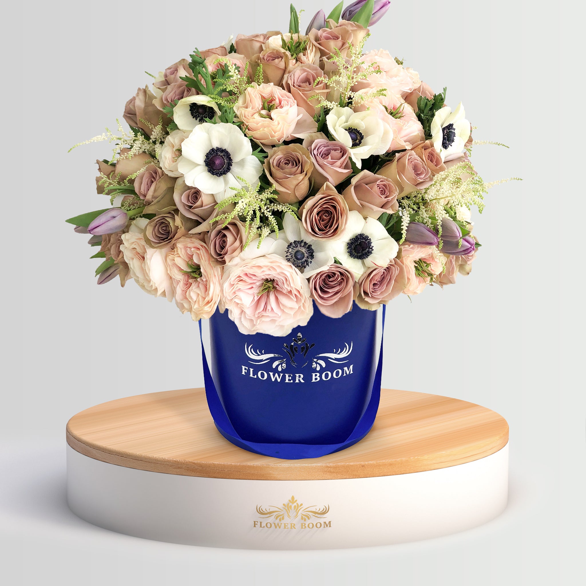 Amnesia roses, Charity garden roses, purple tulips, white Anemones, white Astilbes in a blue box