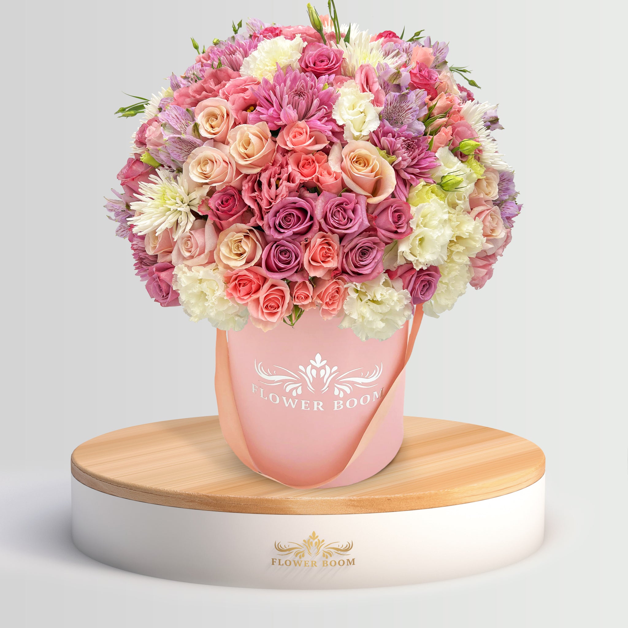 Flower Boom San Francisco Signature roses, pink spray roses, lisianthus & more in a pink round box