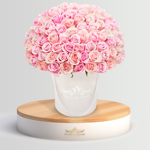 light pink roses in a white smoke box