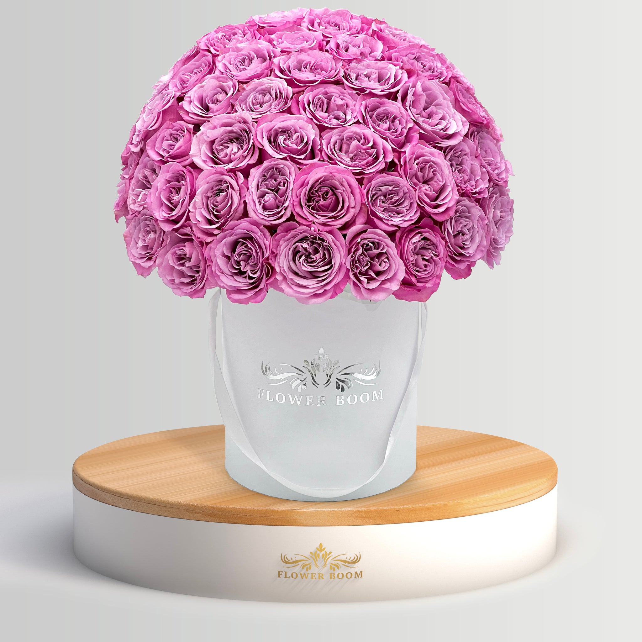 queen's crown lavender rose in a white round box