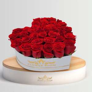 Signature red roses in a heart shaped box