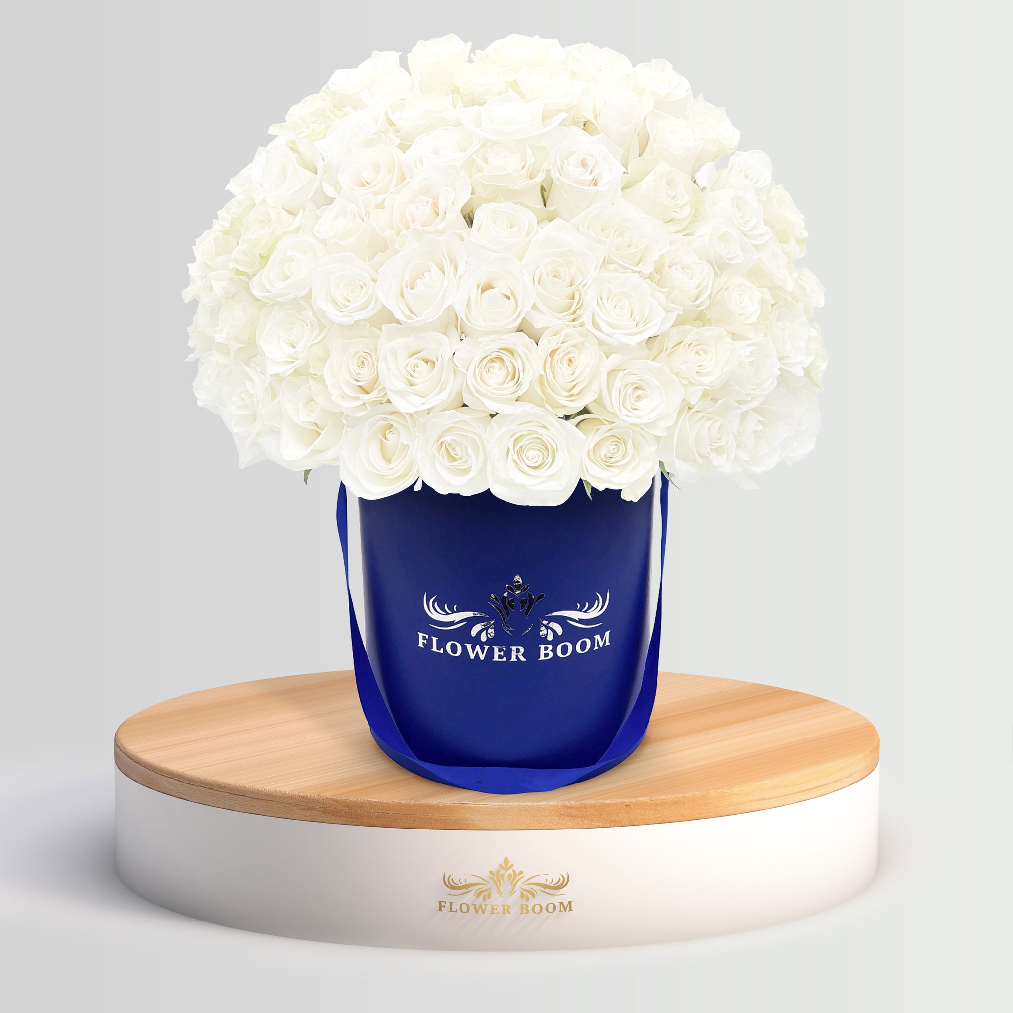 white roses in a blue box