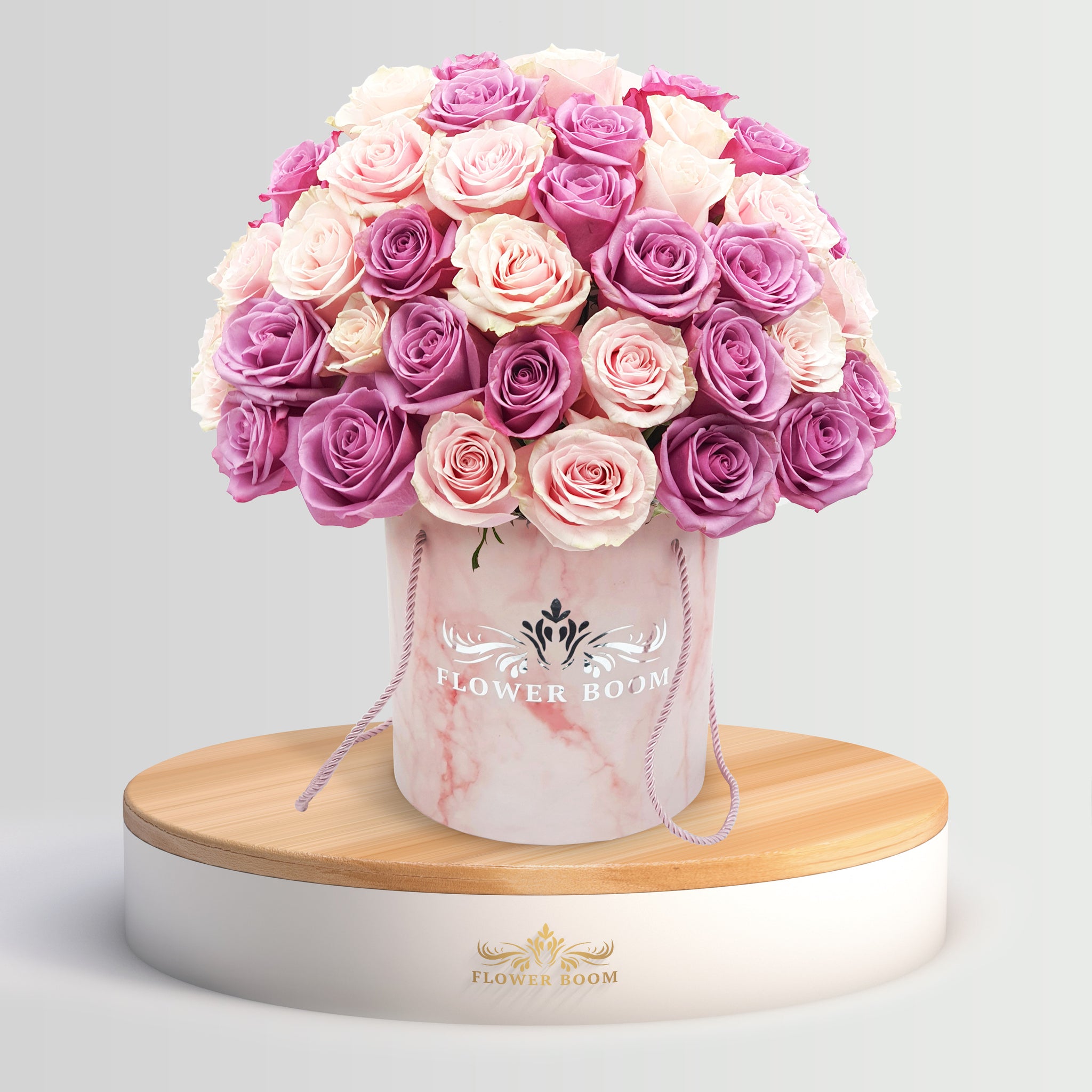 pink and lavender roses in a box