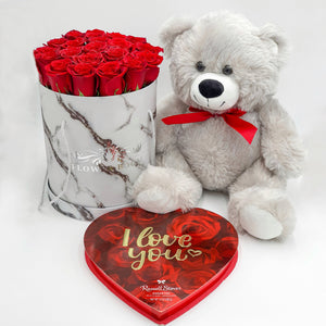 red rose arrangement in marble box, assorted chocolates, plush bear gift set