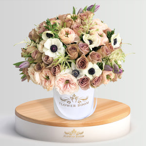 Amnesia roses, Charity garden roses, purple tulips, white Anemones, white Astilbes in a white box